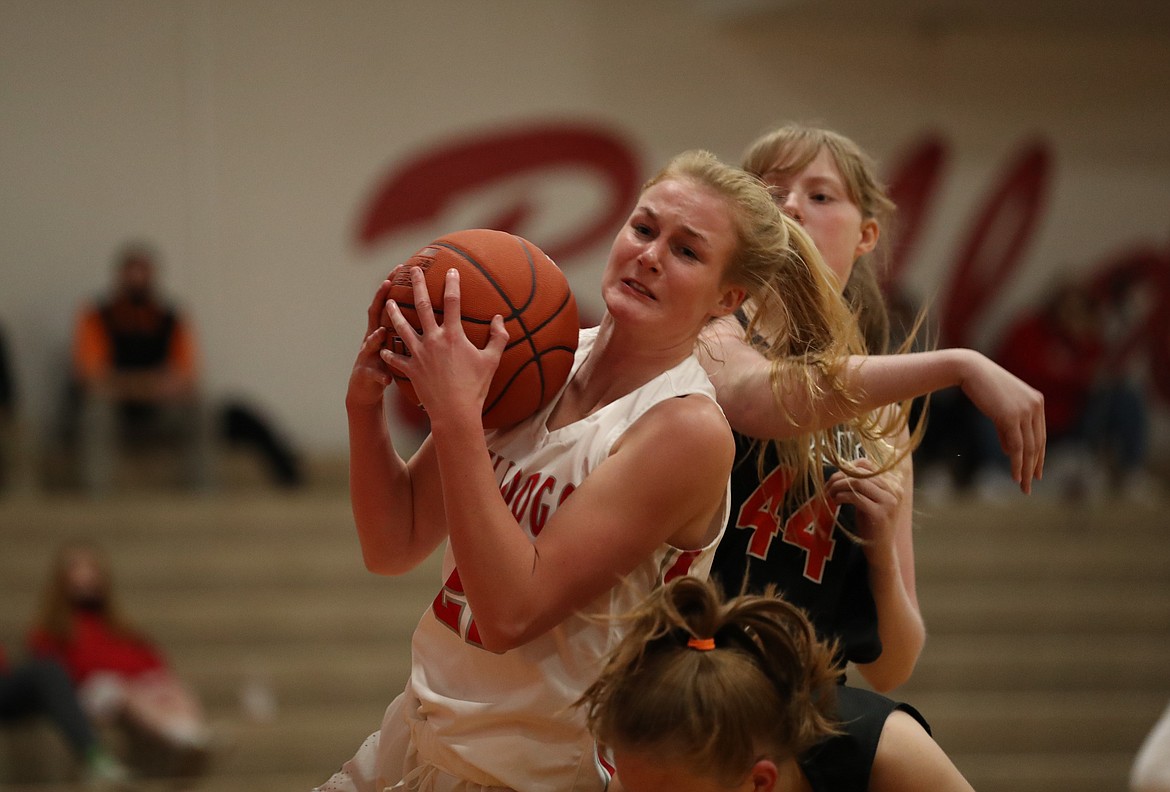 Junior Sofia Platte fights for a rebound in the first half.