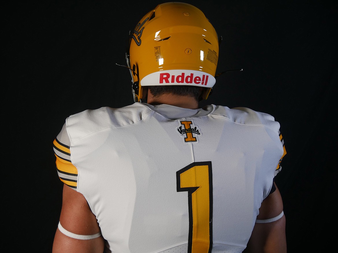 Idaho linebacker Christian Elliss shows off the back of the Vandals road uniform.