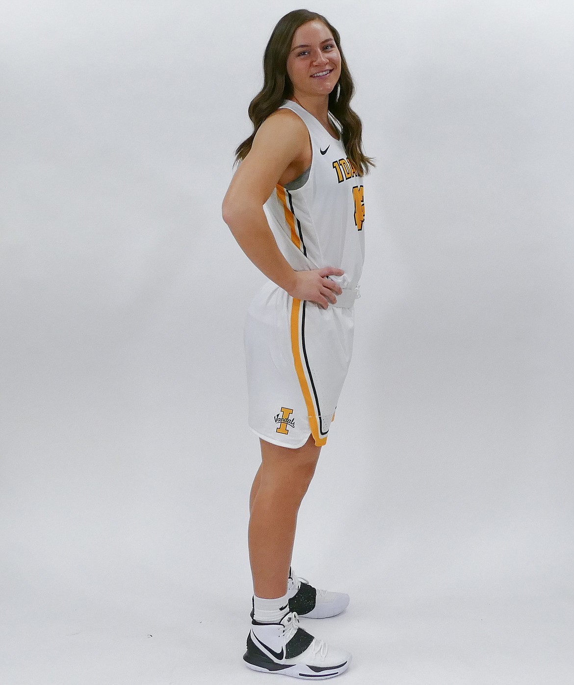 Idaho forward Natalie Klinker shows off the Vandal women's home jersey.