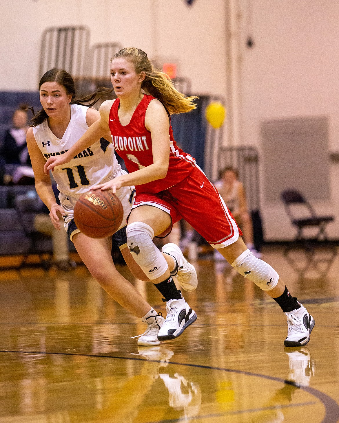 Sophomore Kelsey Cessna drives to the basket during Thursday's game.