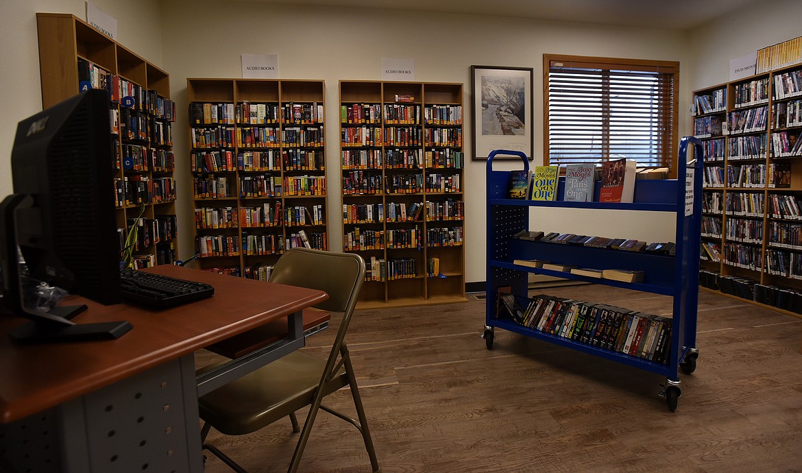 The West Shore Library's collection includes a wide selection on audio books and DVDs. (Jeremy Weber/Daily Inter Lake)