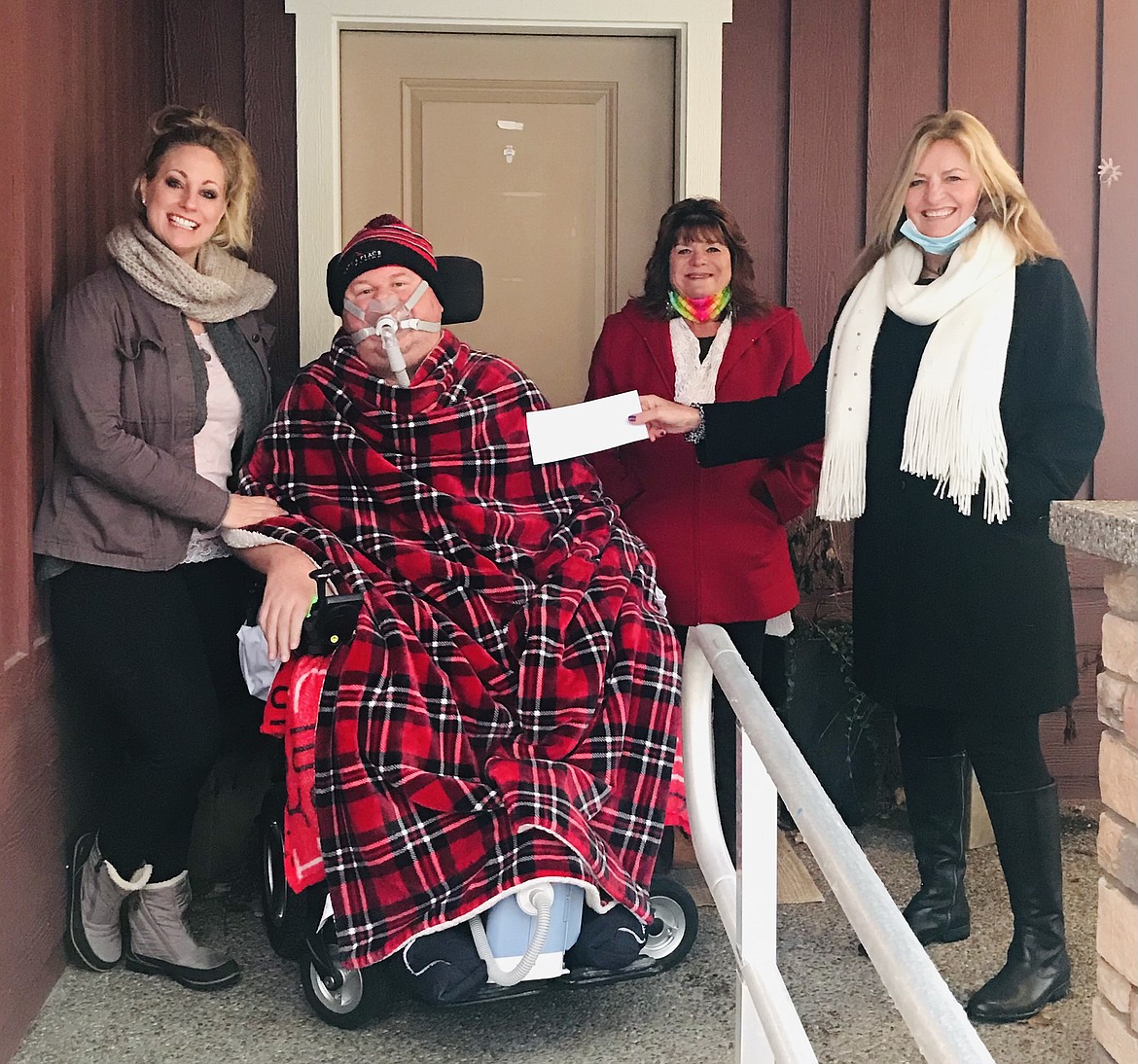 The Coeur d'Alene Eagles Auxiliary #486 recently made a $500 donation to Theresa and Matt Wild with the Matt's Place Foundation. The foundation helps build ramps and remodel homes for families struggling with ALS.  Pictured from left: Theresa and Matt Wild, Debbie Magnuson, Auxiliary Trustee and Barb Smalley, Auxiliary President.