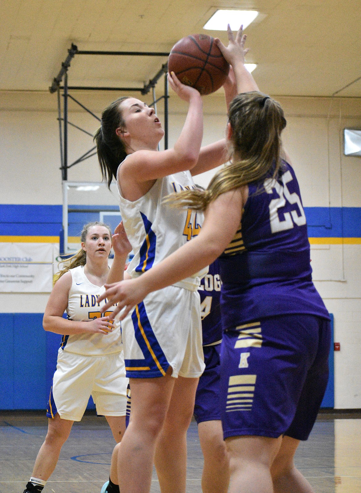 Eva Hoffman goes up for a shot over a Kellogg JV defender during a game last season. Hoffman is one of four seniors on this year's team.