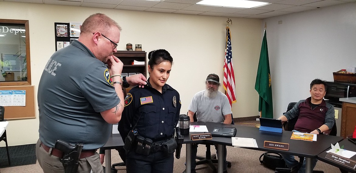 Mattawa mayor Scott Hyndman, (third from left) has announced his resignation, effective Nov. 23. Hyndman is pictured during a promotion ceremony for Mattawa Police Department sergeant Mabeline Pantaleon (second from left). Also pictured are MPD chief Joe Harrs (left) and Mattawa council member Sun Hwang (right).