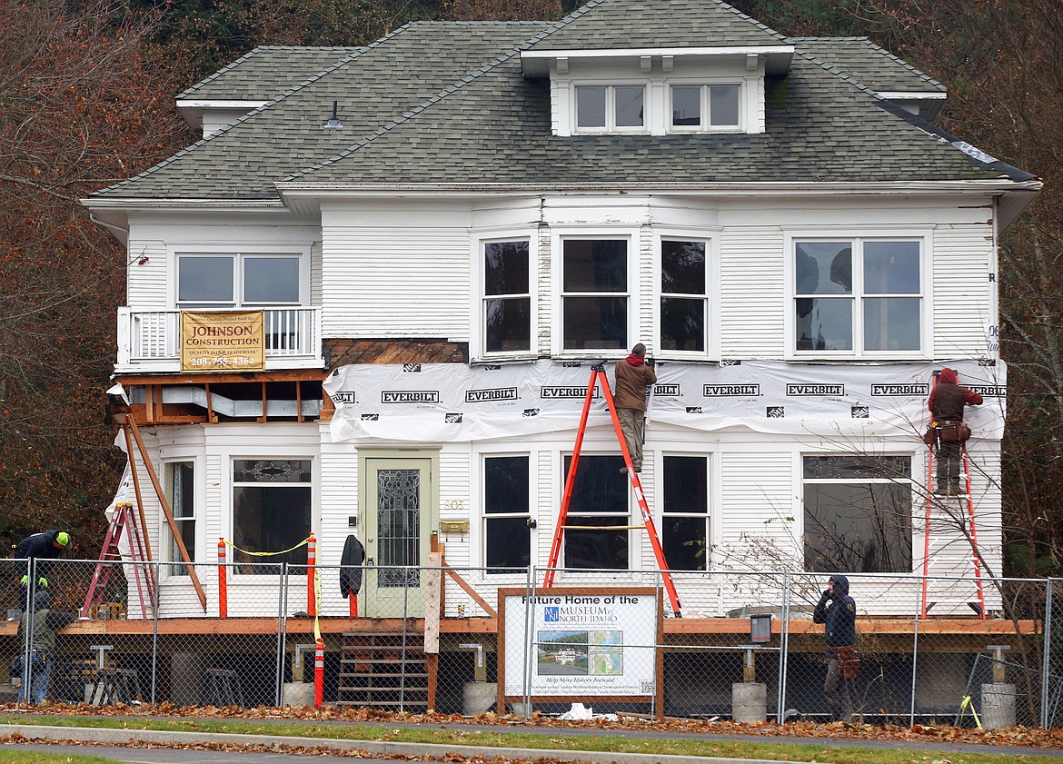 Johnson Construction works on the exterior of the historic J.C. White House at McEuen Park, the future home of the Museum of North Idaho on Tuesday. Total estimated cost for the Moving History Forward project is $4.5 million, which includes renovations to the
J.C. White House, site design and development, an expanded lower level wing, which will house the exhibit hall, and a rooftop terrace. Board-approved designs of the new space on slated to be made public on Dec. 1.