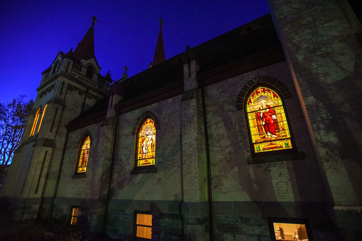 Stained glass windows line the side of St. Matthew's Catholic Church in Kalispell on Saturday, Nov. 21. (Casey Kreider/Daily Inter Lake)