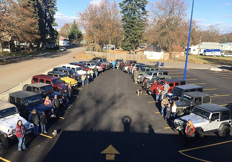 More than 20 North Idaho Jeepers dropped off frozen turkeys and Thanksgiving meal supplies to the St. Vincent De Paul HELP Center last week, aiding the organizations mission to help the homeless. Photo courtesy Larry Riley, St. Vincent De Paul. (MADISON HARDY/Press)