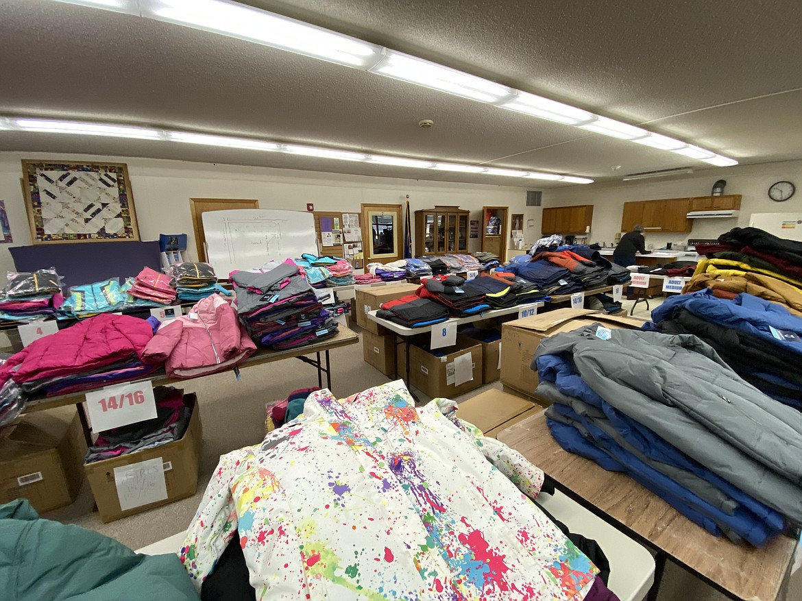 Over 1,500 coats, caps, scarfs, mittens and socks were given away from the Knights of Columbus St. George's Catholic Church on Friday. (MADISON HARDY/Press)