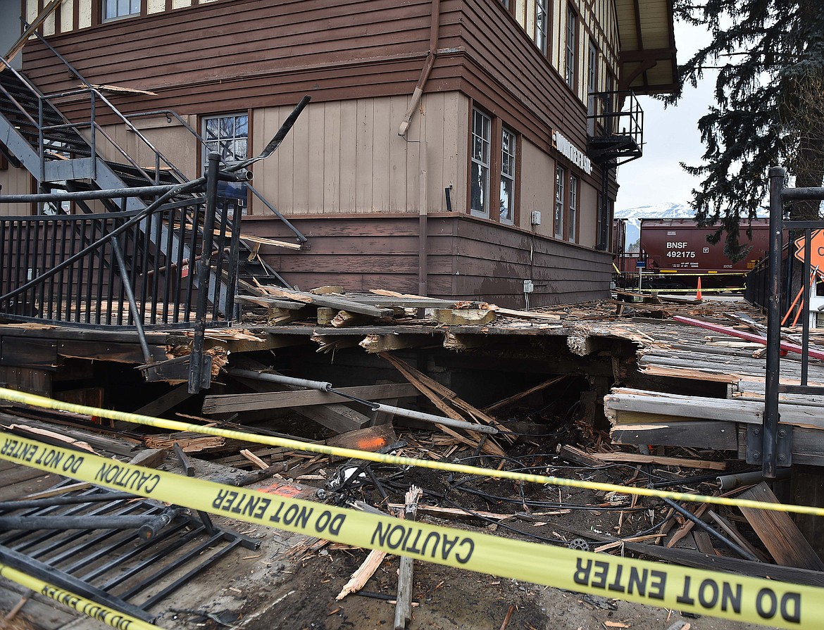 The decking and electrical infrastructure at the historic train depot in Whitefish sustained extensive damage when a vehicle rammed into the structure Sunday morning. The driver, Courtney Holler, of the Whitefish area, was airlifted to a Seattle hospital. Authorities are investigating the crash. (Heidi Desch/Whitefish Pilot)