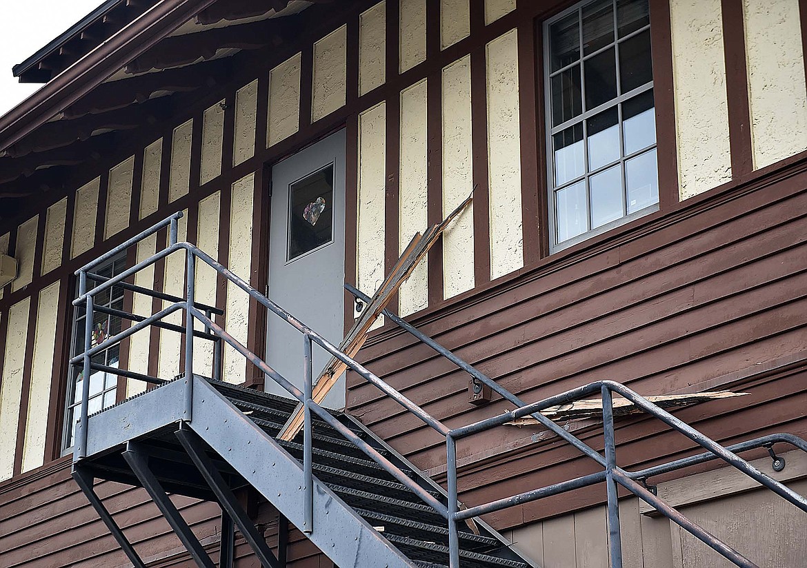 The driver of a pickup truck crashed into the Whitefish Depot building Sunday heavily damaging the deck around the building. Large pieces of wood landed on an outside staircase on the second floor of the building. (Heidi Desch/Whitefish Pilot)