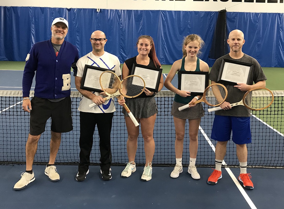 Courtesy photo
Clint Harames, second from left, and daughter Kyra Harames won the mixed doubles division at the recent "Old School is Good School Wood Classic" wood tennis tournament at Peak Health and Wellness in Hayden. Audrey Dudson, second from right, and her father Jeff Judson were finalists. At left is Steve Clark, director of tennis at Peak.