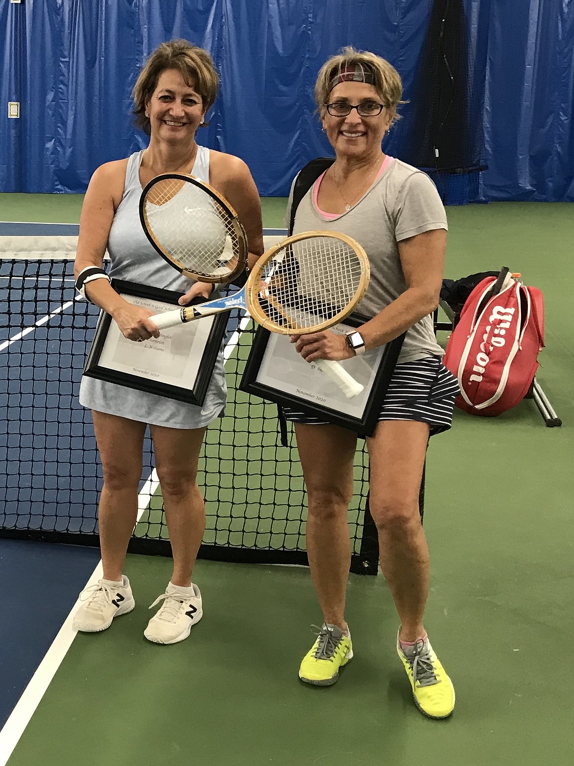 Courtesy photo
Lea Williams, left, won the women's singles division at the recent "Old School is Good School Wood Classic" wood tennis tournament at Peak Health and Wellness in Hayden. At right is finalist Dawn Mehra.