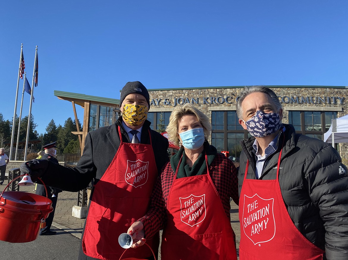 The Mayors' Kettle program through The Salvation Army Kroc Center is the most successful fundraiser of the year, helping to provide social services for Kootenai County families in need. Pictured from left: Post Falls Mayor Ron Jacobson, Fernan Lake Village Mayor Heidi Acuff, Coeur d'Alene Mayor Steve Widmyer. (MADISON HARDY/Press)
