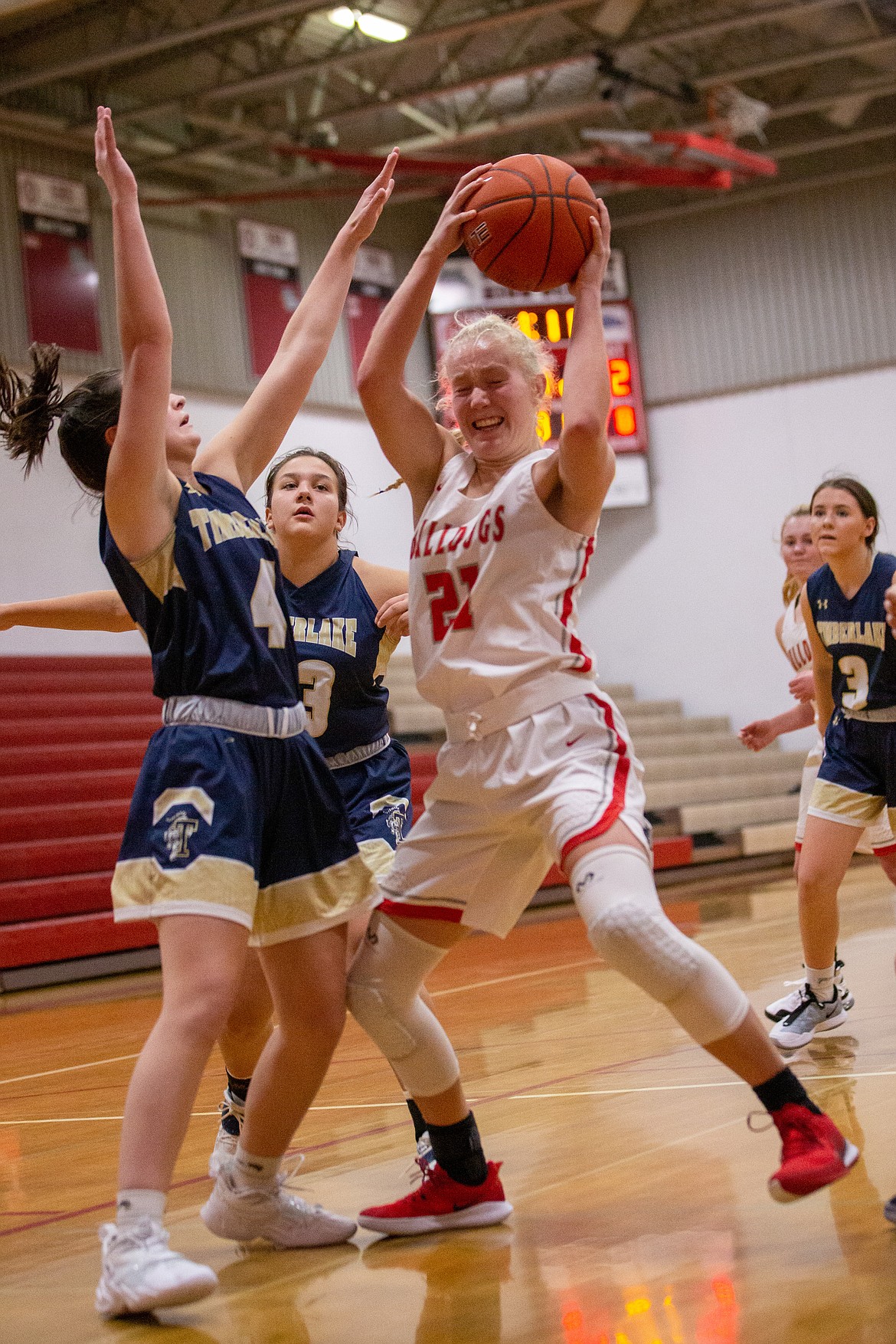 Senior Hattie Larson fights in the paint for a rebound on Thursday.