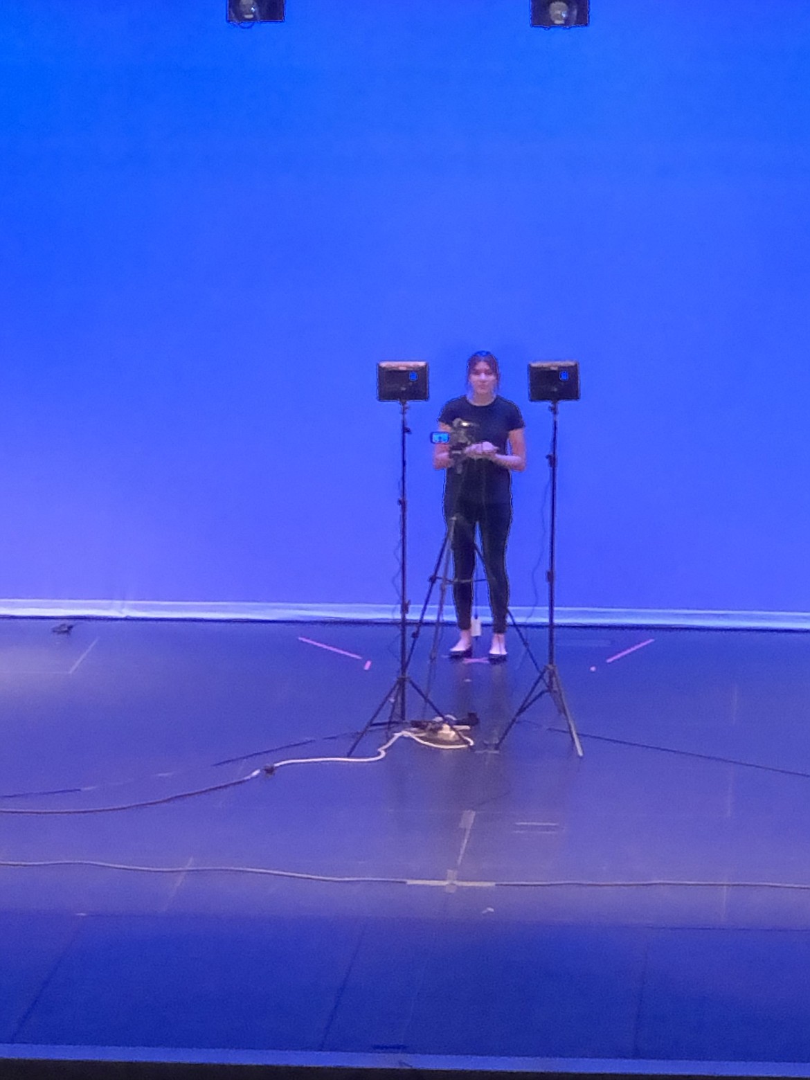 Stephanie Sanchez and the rest of the cast of the Quincy High School production "Paciencia y Fe" performed alone in an empty theater, one of the many challenges presented by the coronavirus outbreak.