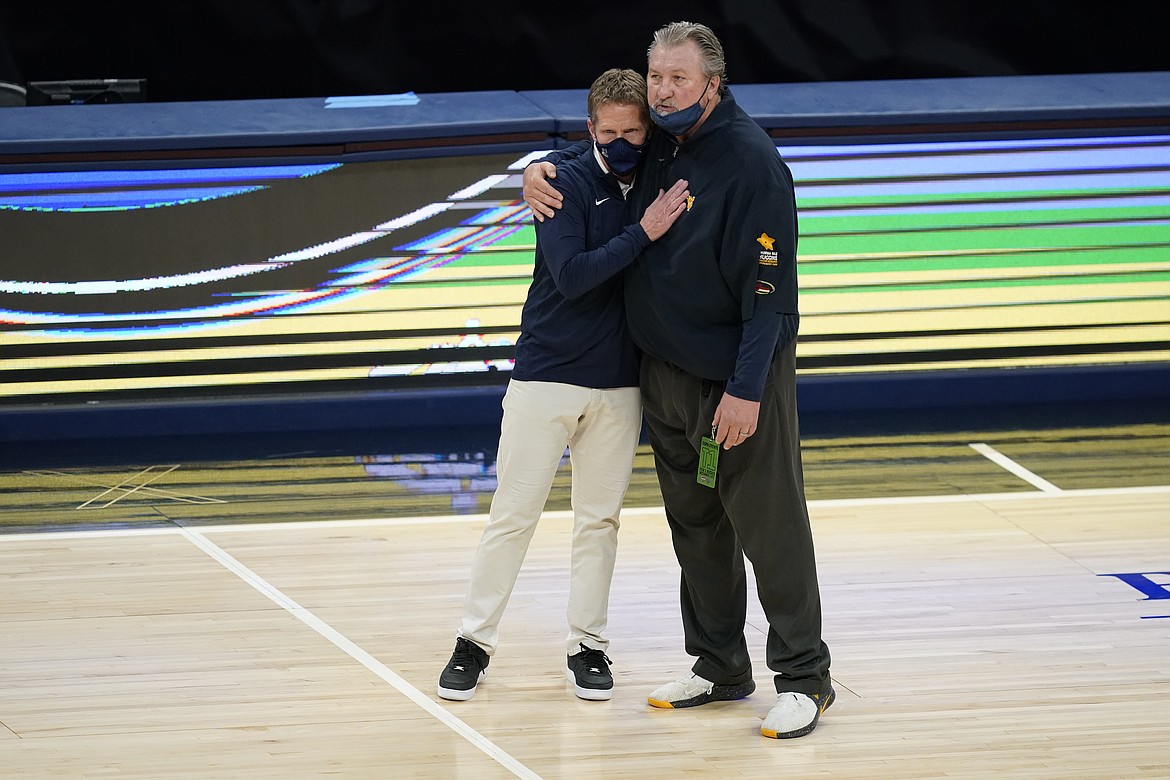 DARRON CUMMINGS/Associated Press
Gonzaga coach Mark Few and West Virginia coach Bob Huggins share a hug after Gonzaga beat West Virginia 87-82 last Wednesday in Indianapolis.