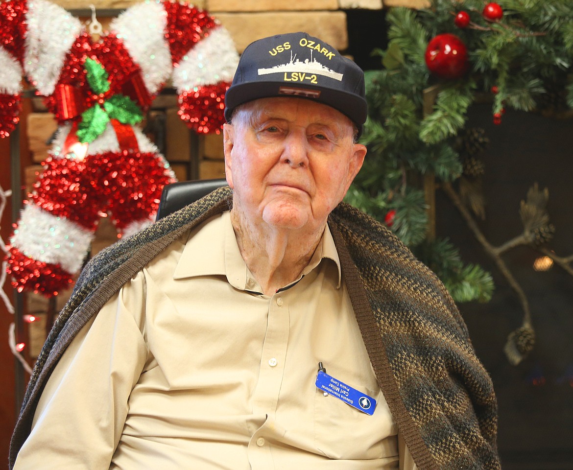 Veteran Carl Miller talks about Dec. 7 and about his role with the military on Monday at The Bridge in Post Falls.