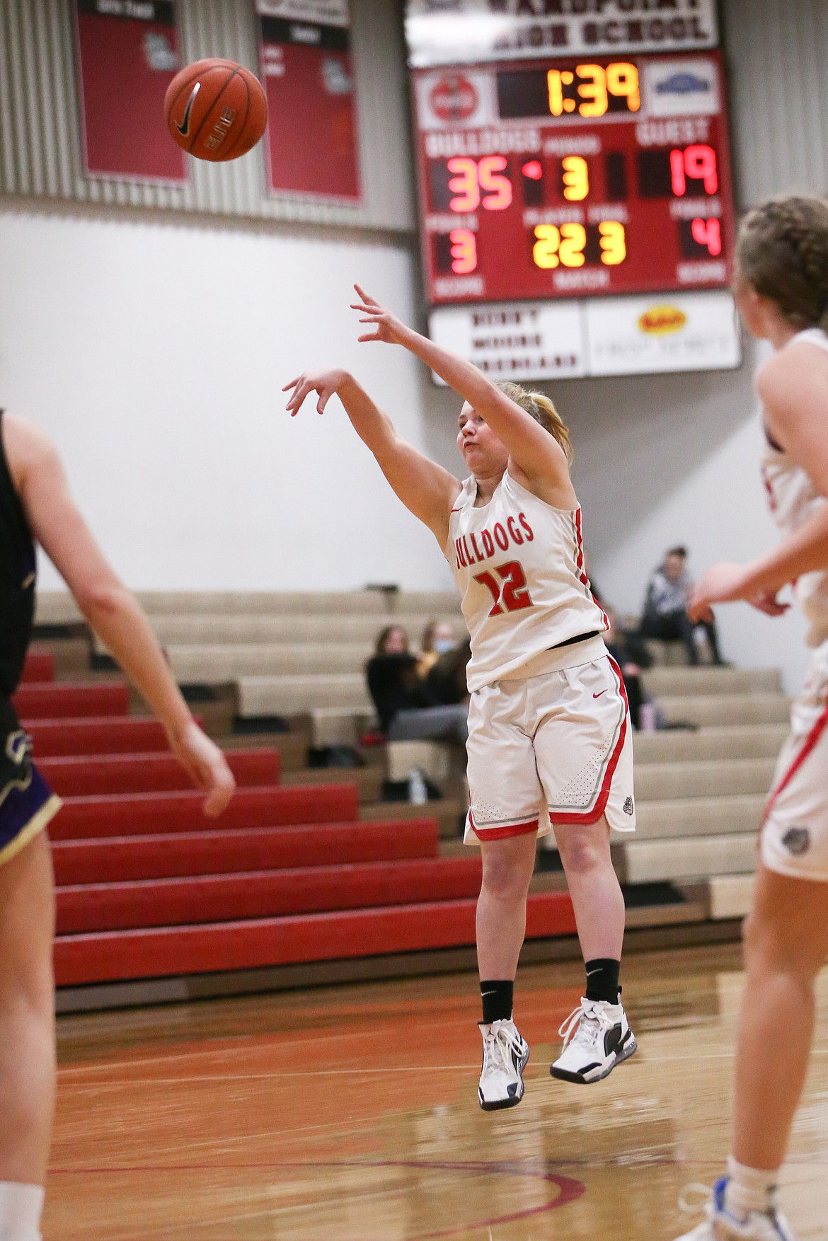 Senior Riley Cessna fires a 3-pointer in the second half of Tuesday's game.