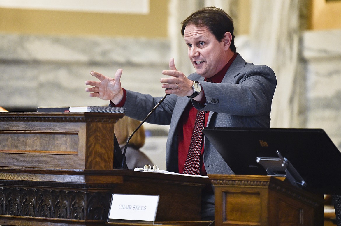 Rep. Derek Skees, R-Kalispell, speaks during a meeting of the Joint Rules Committee on Monday, Dec. 7, 2020, on the House floor of the Montana State Capitol, in Helena, Mont. (Thom Bridge/Independent Record via AP)