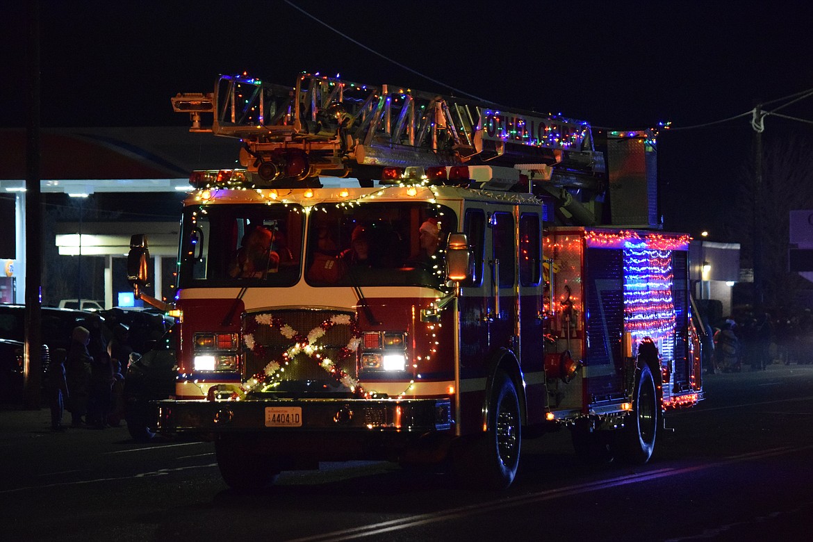 An Othello Fire Department truck in last Saturday's Christmas Miracle on Main Street parade.