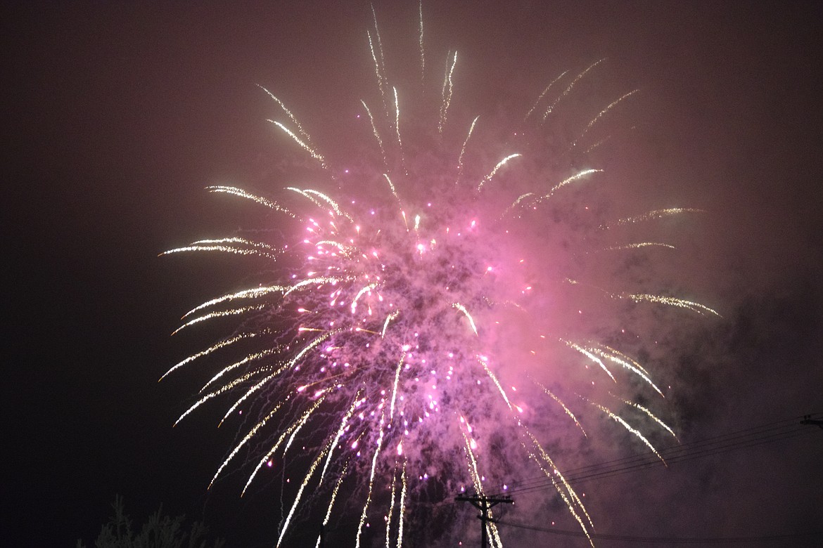 A firework lights up a fog-filled sky on Lions Park in Othello during the long-delayed 4th of July fireworks show following the Christmas Miracle on Main Street parade last Saturday.