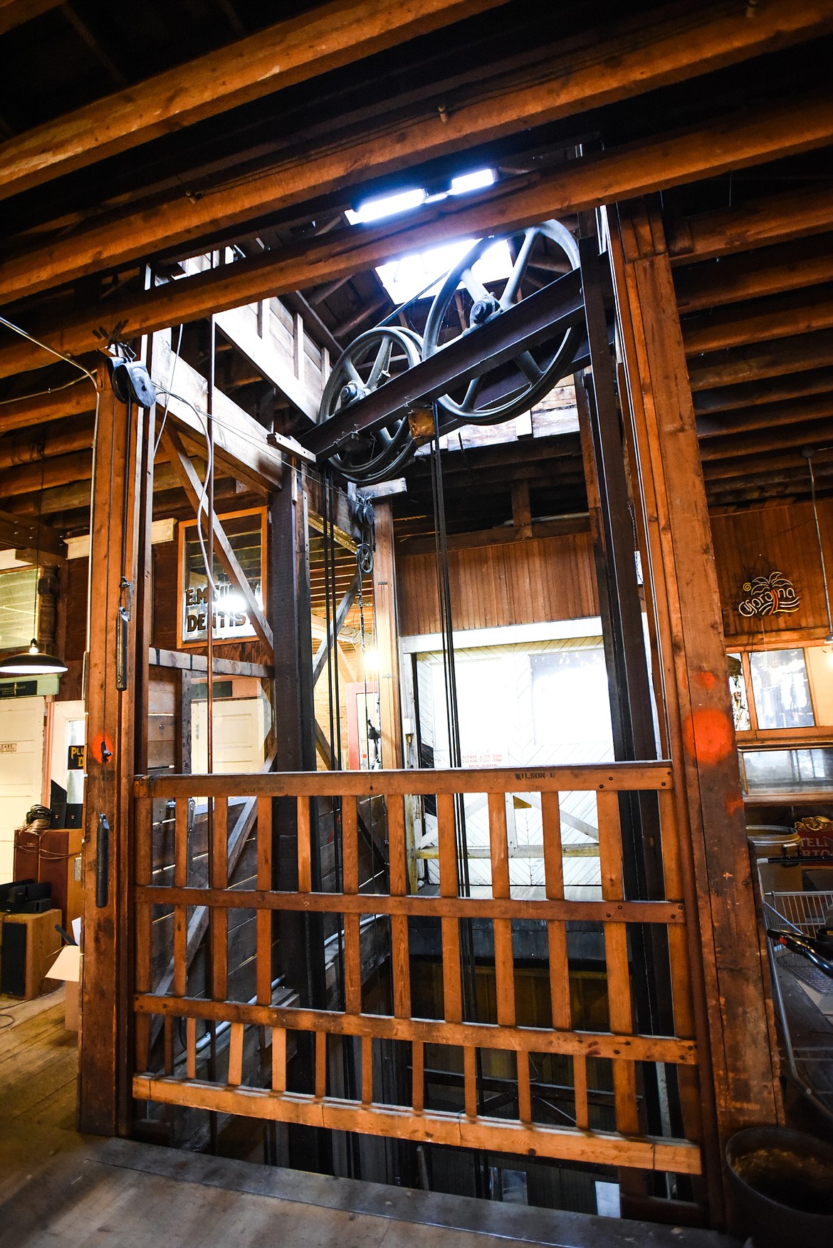 An Otis freight elevator built in 1903 inside what Bill Goodman refers to as the "warehouse" at the KM Building in Kalispell on Friday, Dec. 4. (Casey Kreider/Daily Inter Lake)