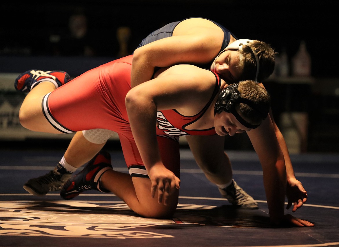 Sandpoint's Carson Laybourne battles Bonners Ferry's Jackson Richter during a 285-pound match on Thursday at BFHS.