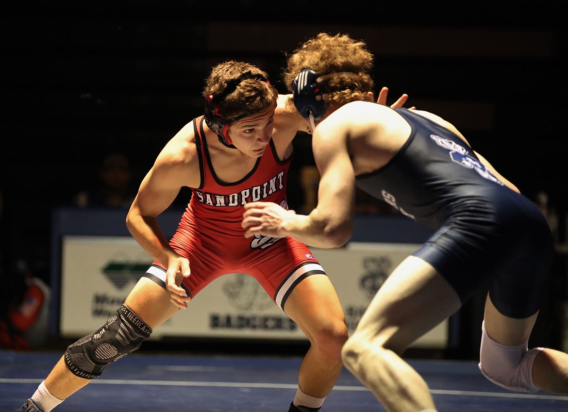 Sophomore Darrian Resso (left) takes on Spencer Eby from Bonners Ferry on Thursday.