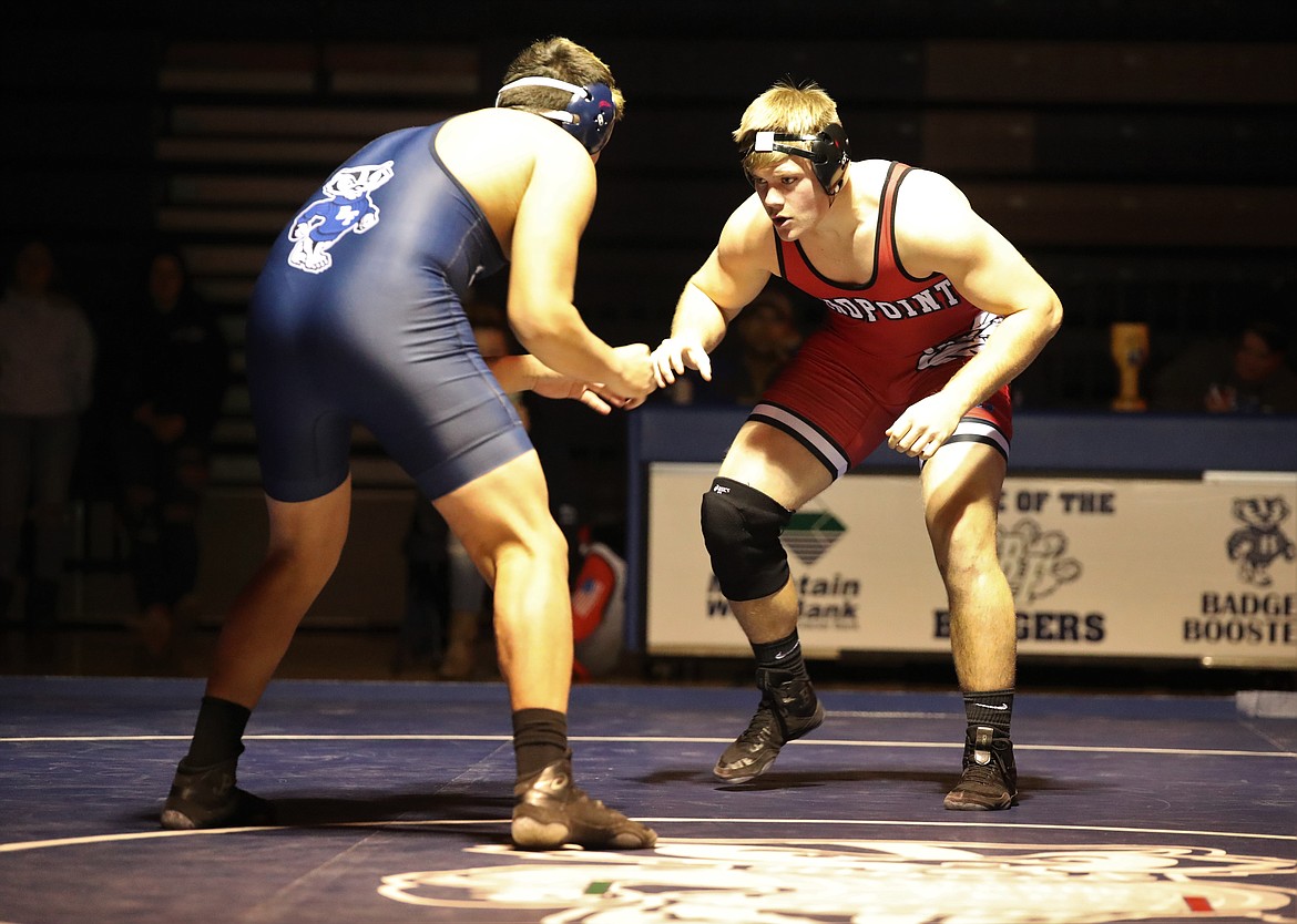 Senior Tag Benefield (right) battles Bonners Ferry's Isaiah Shottanana during a 220-pound bout on Thursday. The match decided the "B" Cup and Shottanana prevailed.