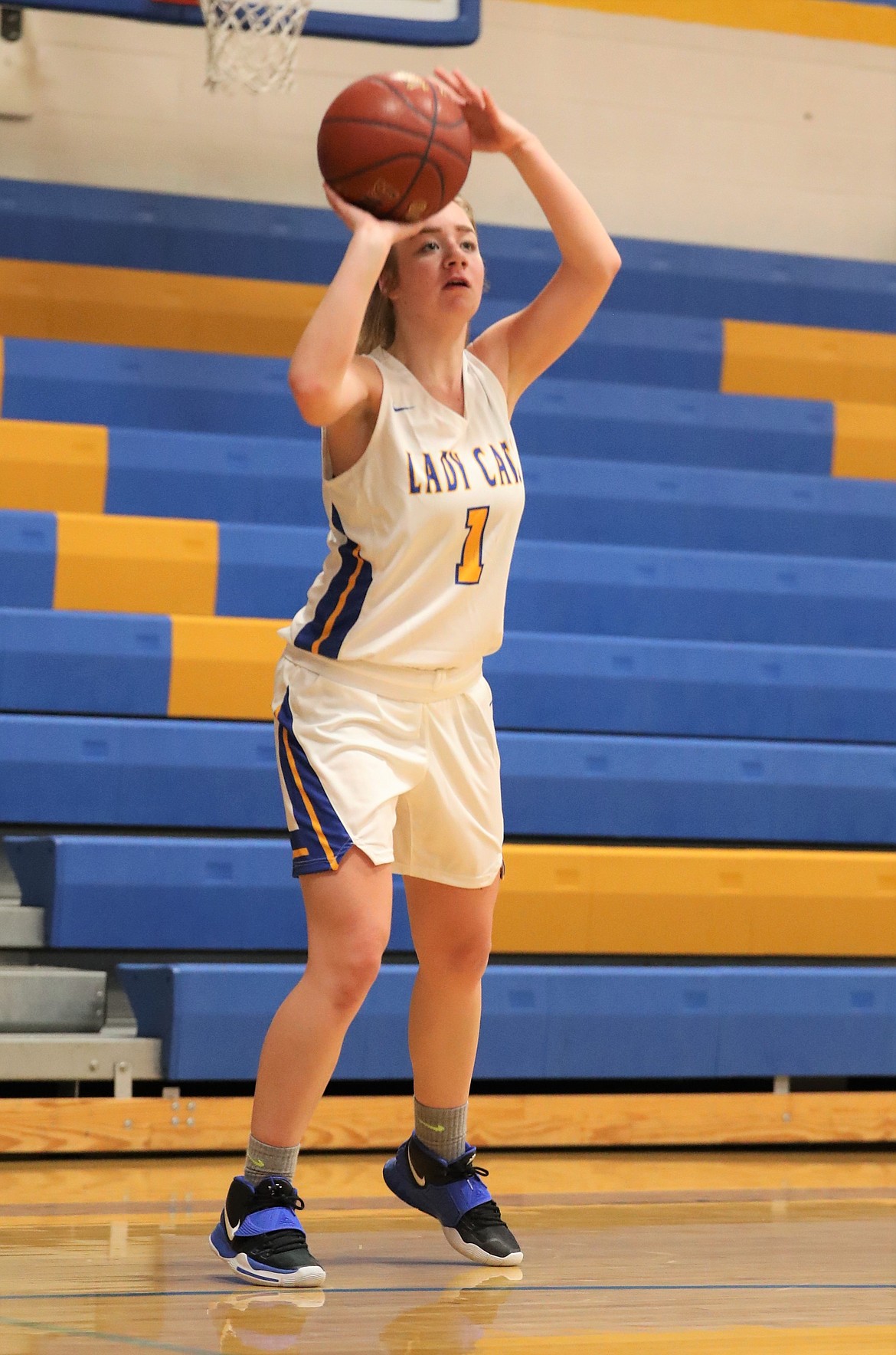 Junior Katelyn Matteson hits a 3-pointer in the closing seconds of Friday's game.