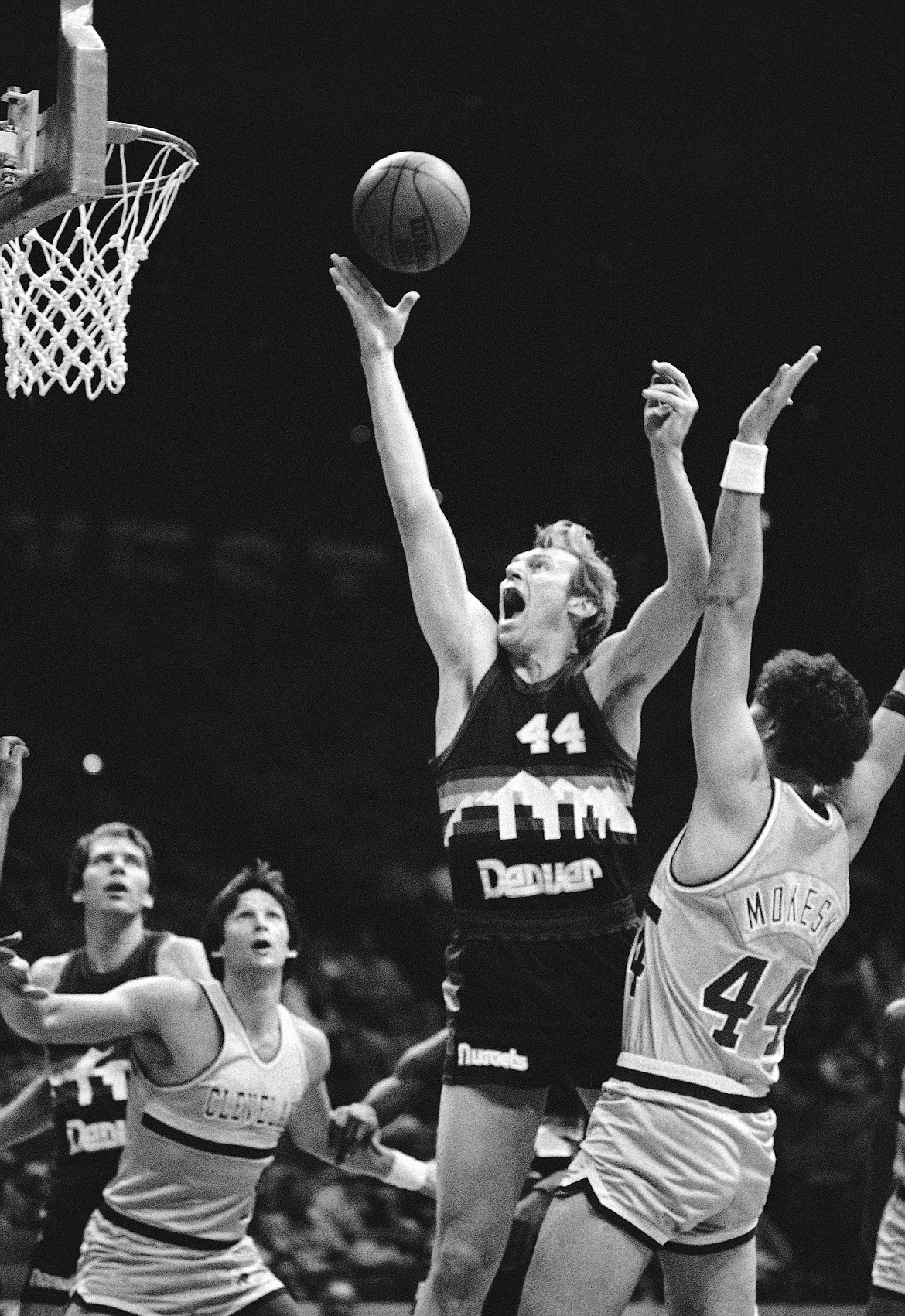 MARK DUNCAN/Associated Press
Denver Nuggets center Dan Issel (44) grabs a rebound as Cleveland Cavalier center Paul Mokeski challenges during a Dec. 10, 1982 game in the Richfield (Ohio.) Coliseum.