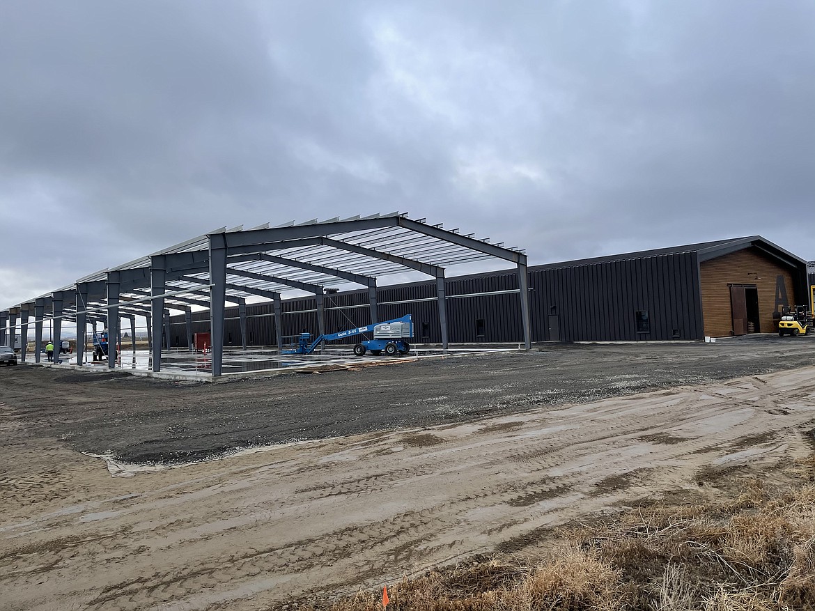 Woodinville Whiskey Co. is building a third warehouse to age bourbon and rye whiskey southwest of Quincy.