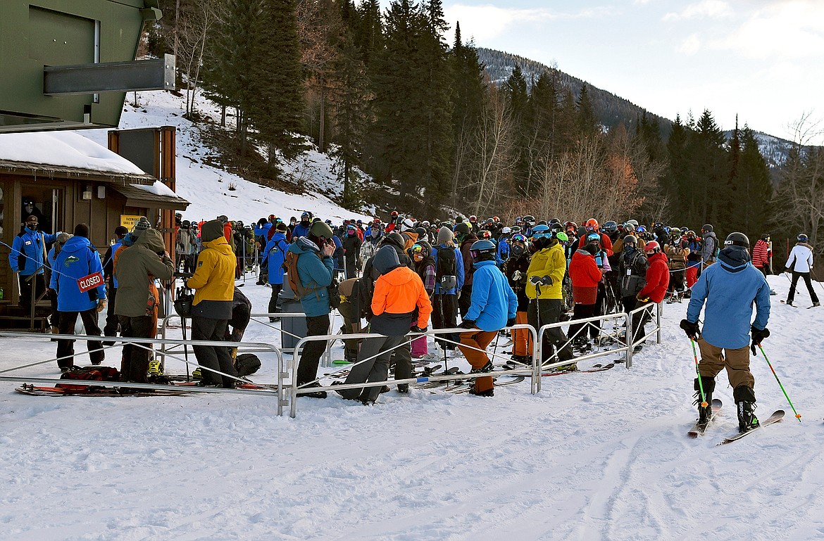 Skiers and snowboarders gather in lift lines waiting for the chairlifts to turn at Whitefish Mountain Resort the morning of opening day of the 2020-21 season Thursday, Dec. 10. (Whitney England/Whitefish Pilot)