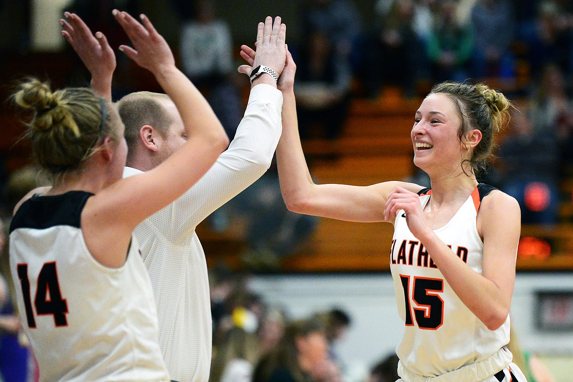 Flathead's Clare Converse (15) celebrates as she comes off the court at the end of the first half after the Bravettes built a 27-17 lead over Glacier during a crosstown matchup at Flathead High School on Thursday. Glacier won, 51-49. (Casey Kreider/Daily Inter Lake)