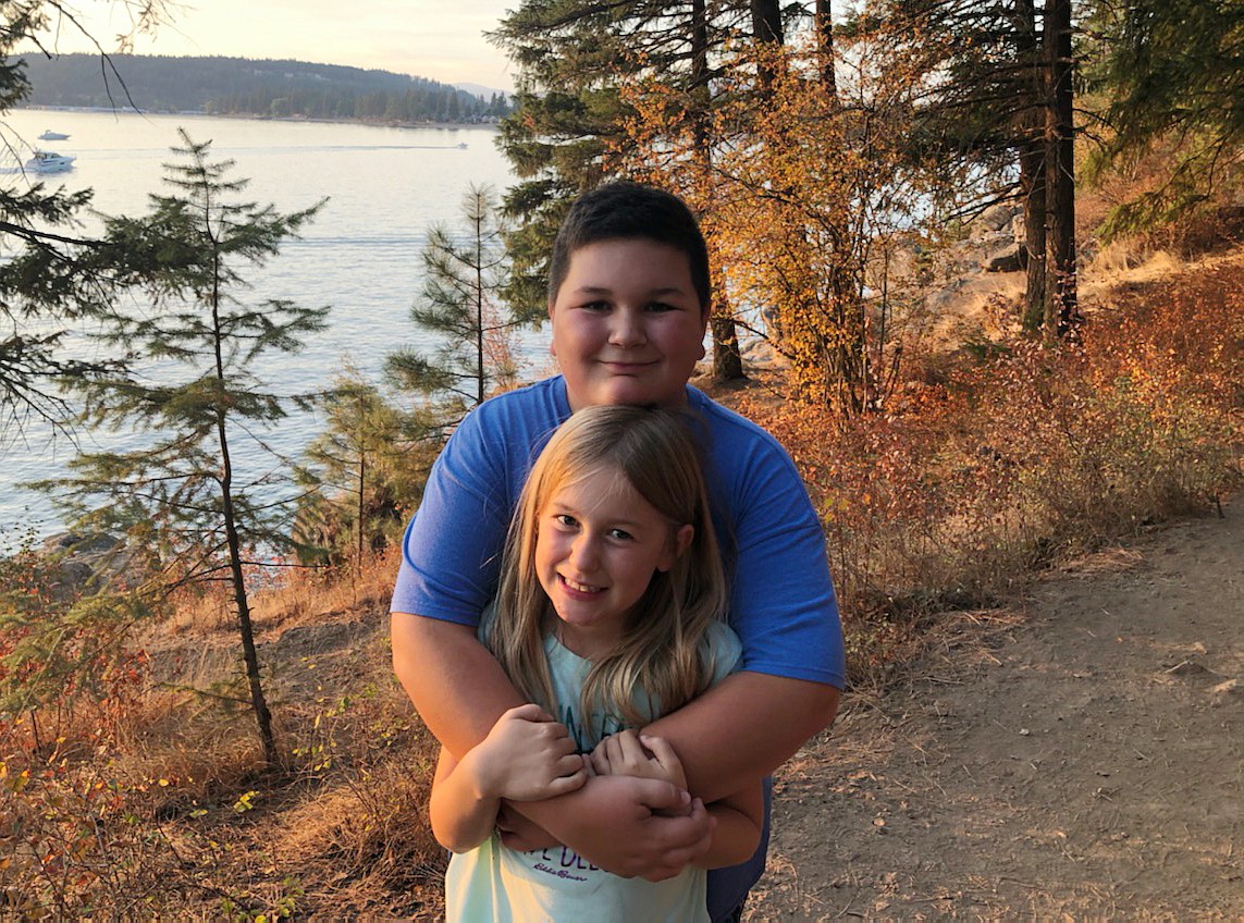 Markham siblings Jacob, 14, and Ellie, 8, are seen here Oct. 8 on Tubbs Hill, when their family swam in Lake Coeur d'Alene one more time before the weather turned colder. Jacob is now recovering from an emergency surgery that removed a mass from his brain.