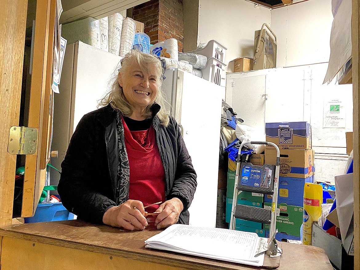 Charlotte Hooper, the head-organizer and powerhouse of the ABC Food Bank in Athol standing in her dutch door window ready to help the next family in need Tuesday morning. (MADISON HARDY/Press)