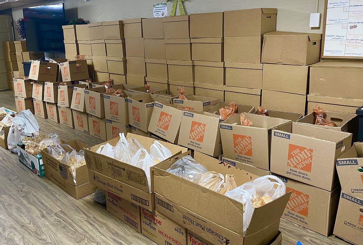 The Joshua Brandt Foundation donated 60 Christmas meal boxes to the ABC Food Bank Tuesday morning, which would help feed over 200 families in the Athol, Bayview, Careywood area. (MADISON HARDY/Press)