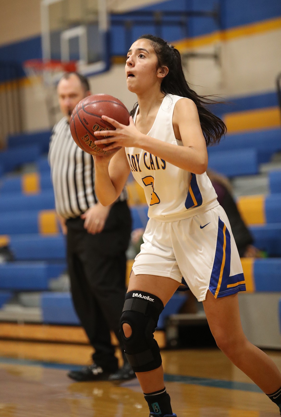 Sophomore Emily Myers attempts a 3-pointer during the first quarter of Tuesday's game.