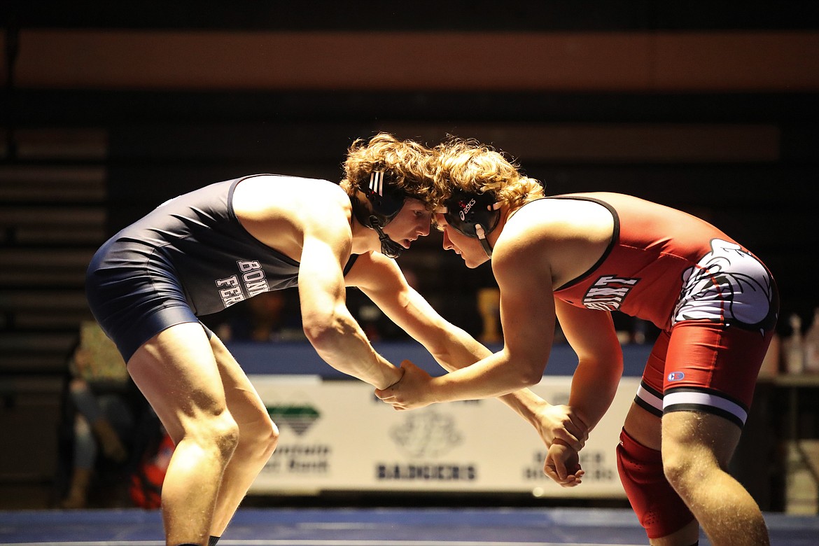 Eli Richards (left) faces off Sandpoint's Blake Sherrill at 182 pounds last Thursday at BFHS.