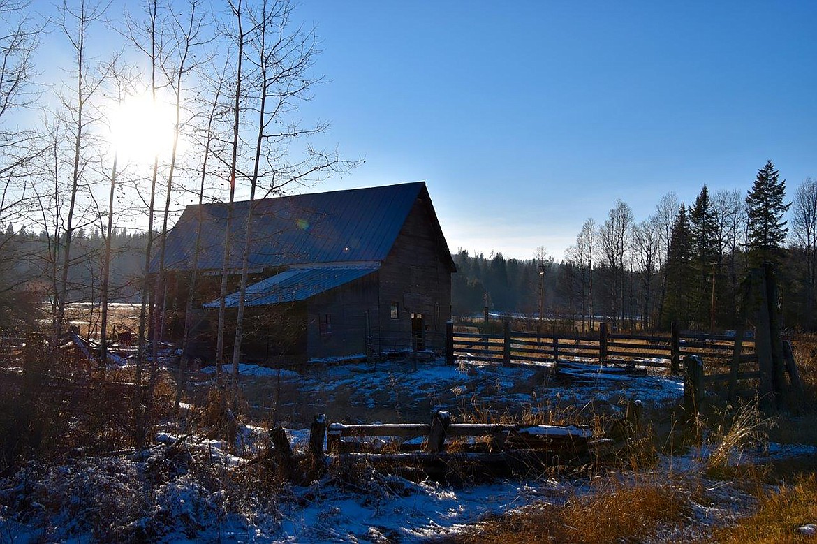 A barn stands sentinel to the winter's snows in this scene captured by local photographer Robert Kalberg.