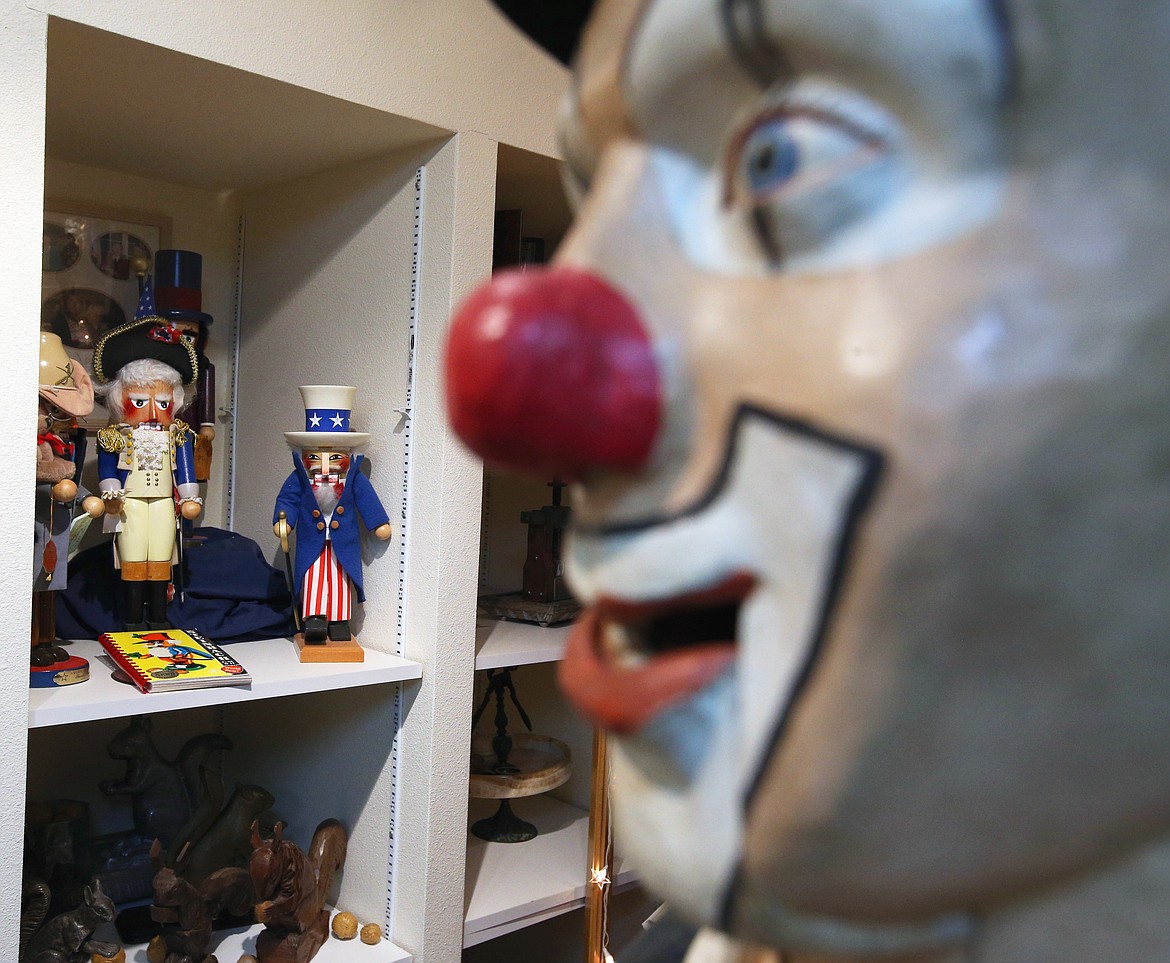 A six-foot clown nutcracker smiles over the rest of the collection.