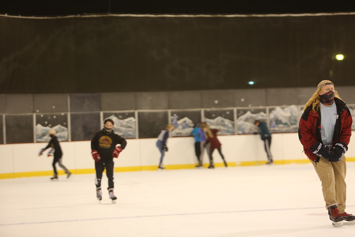 Rink Guard Thomas Molitor, right, has been playing on the Moses Lake ice rink since he was four, and recently returned to town while continuing college online during the pandemic.