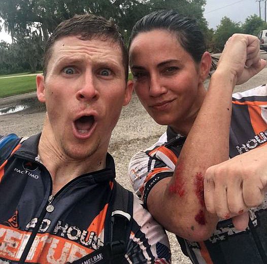 Jesse Nelson reacts to teammate Kristin Castro's injury sustained by colliding with a wild pig during the cycling section of the Sea to Sea Adventure Race in Florida. (courtesy photo)