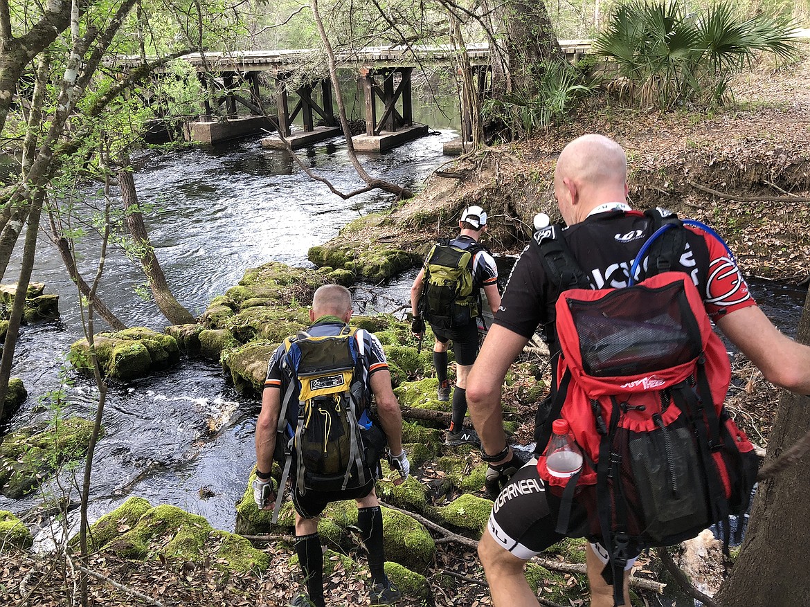 Jesse Nelson and his teammates make their way between checkpoints during an adventure race. (courtesy photo)