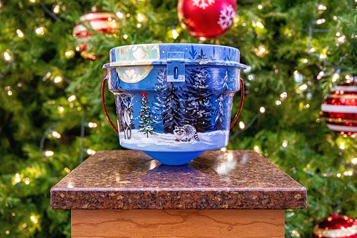 Artist Christina Hull's painted Kettle of Dreams will be on display Saturday at the east entrance of Fred Meyer.