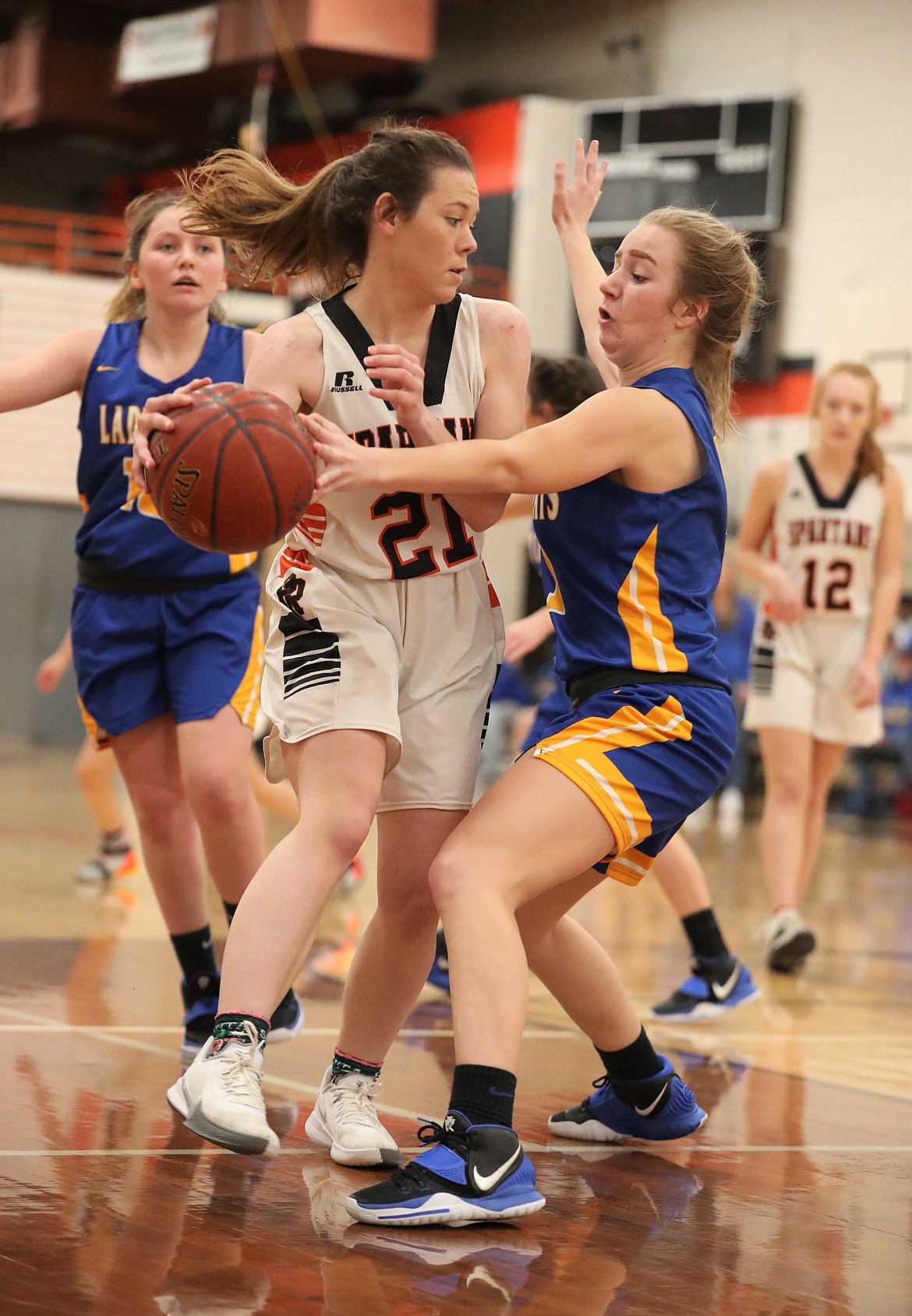 Priest River's Hannah Palfrey (left) attempts to slip a pass past Clark Fork's Katelyn Matteson on Friday.