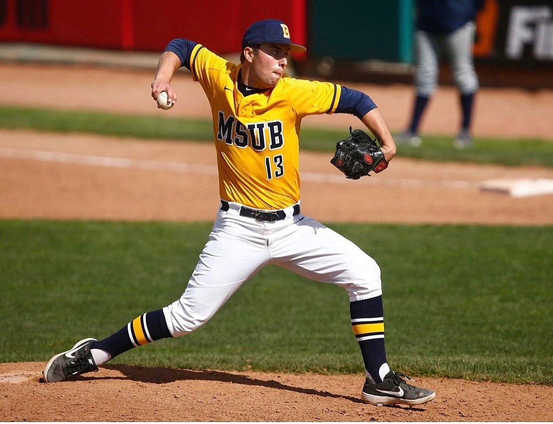 Jared Winslow winds up for pitch while playing for Montana State University Billings. (Courtesy of Jared Winslow)