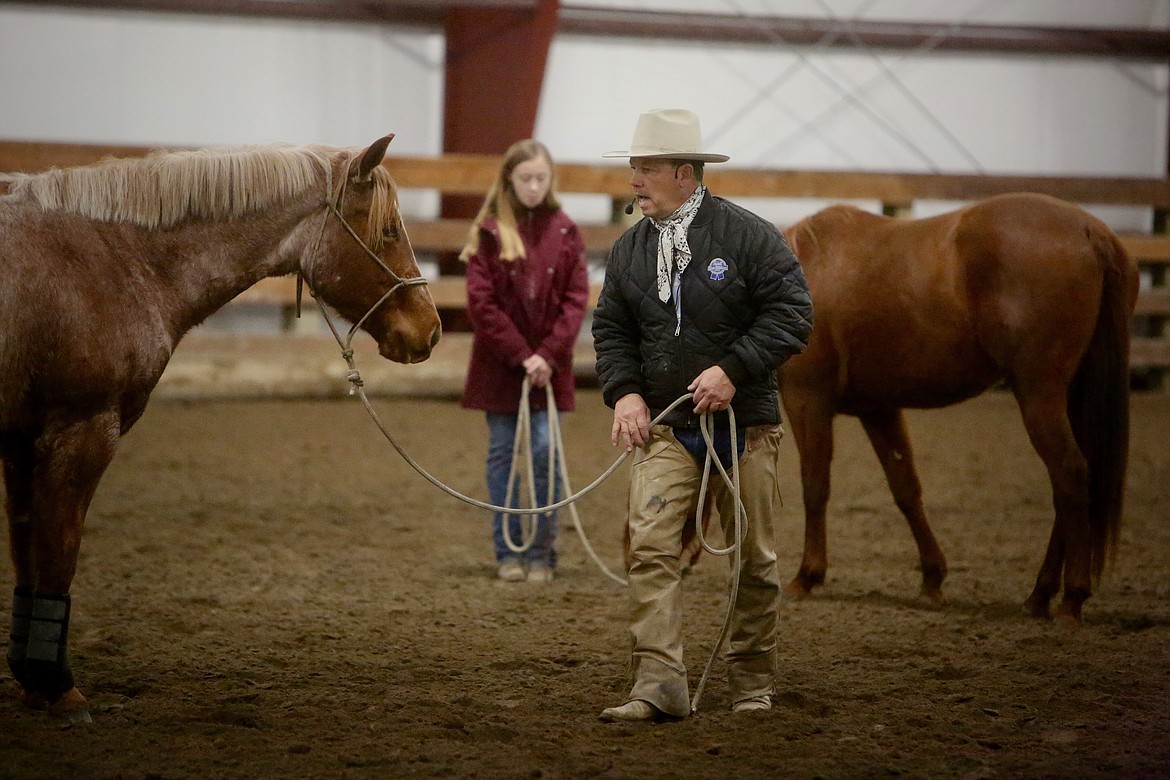 Dave Gamble leads a horsemanship workshop at Standing Heart Ranch the afternoon of Saturday, Dec. 19. (Mackenzie Reiss/Daily Inter Lake)