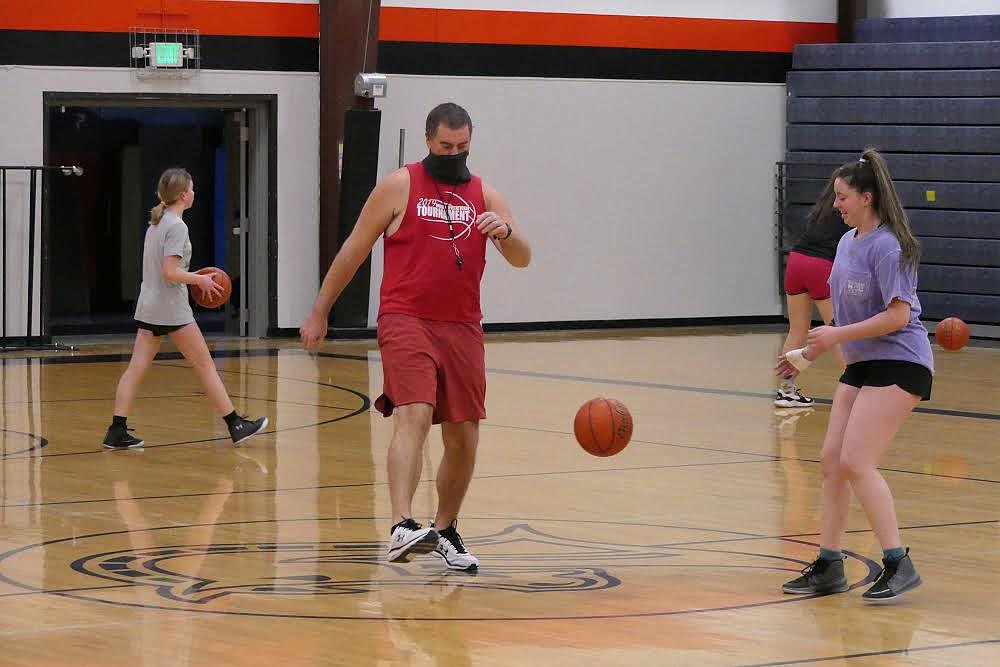 Plains girls basketball coach Eddie Fultz shows off his “soccer” skills during practice last week. (Chuck Bandel/Valley Press)