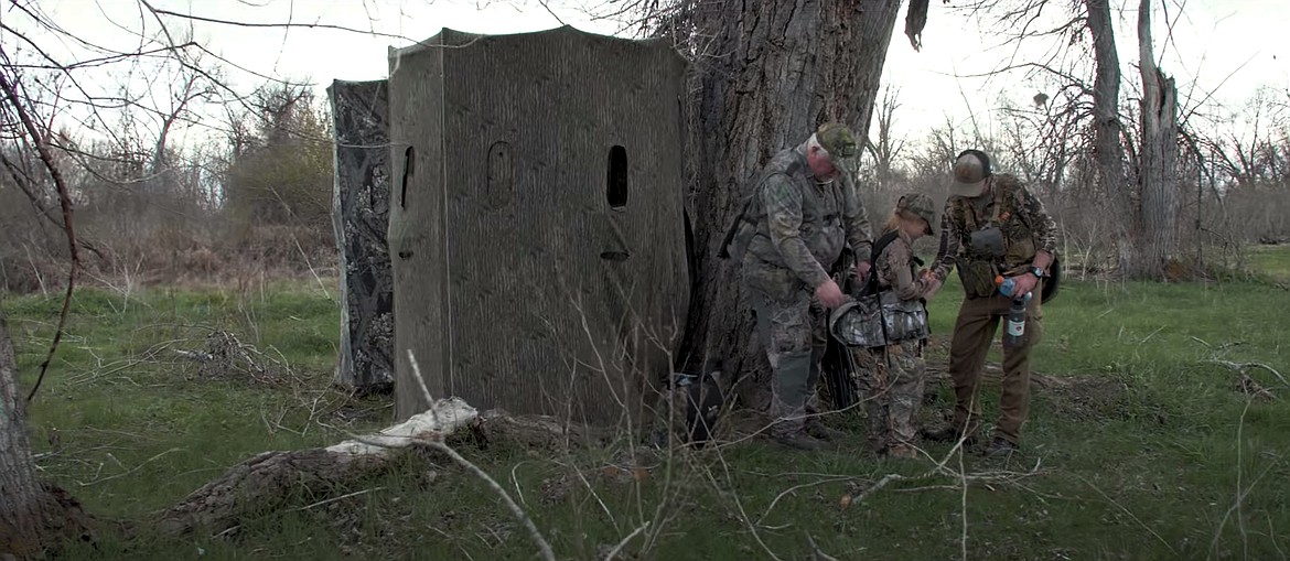 Clara and her father Kurtis are pictured hunting for turkeys in this screenshot from the third installment of an Idaho Fish & Game video series, "Maiden Hunt", which explores new hunters and their mentors as they learn about hunting.